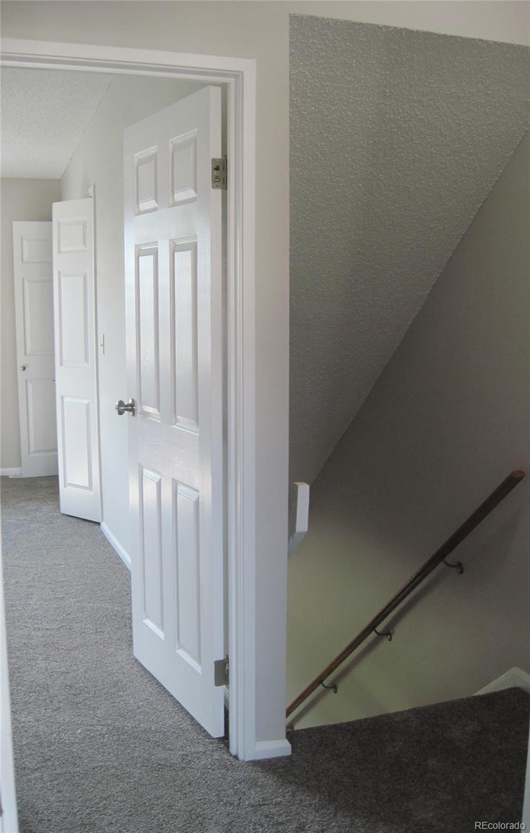 258 West Rockrimmon Boulevard, Unit F Colorado Springs, CO 80919 - Photo 24 of 41 a view of a livingroom with entryway