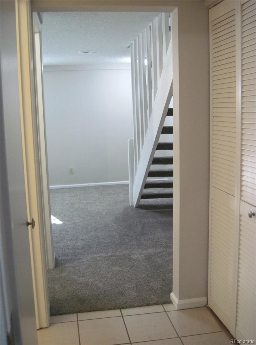 258 West Rockrimmon Boulevard, Unit F Colorado Springs, CO 80919 - Photo 29 of 41 a view of a hallway with entryway