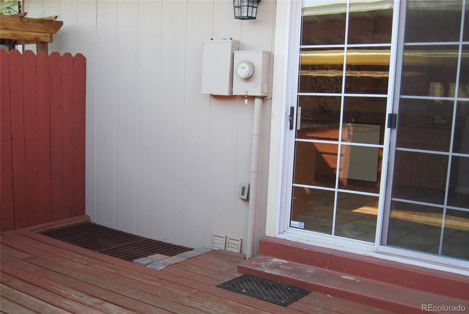 258 West Rockrimmon Boulevard, Unit F Colorado Springs, CO 80919 - Photo 36 of 41 a view of a door and a window