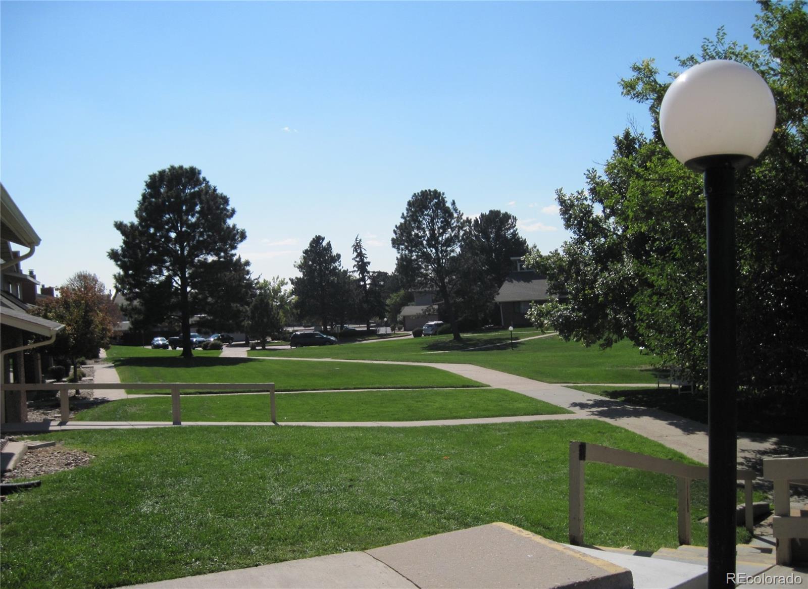 258 West Rockrimmon Boulevard, Unit F Colorado Springs, CO 80919 - Photo 37 of 41 a view of a golf course with a garden