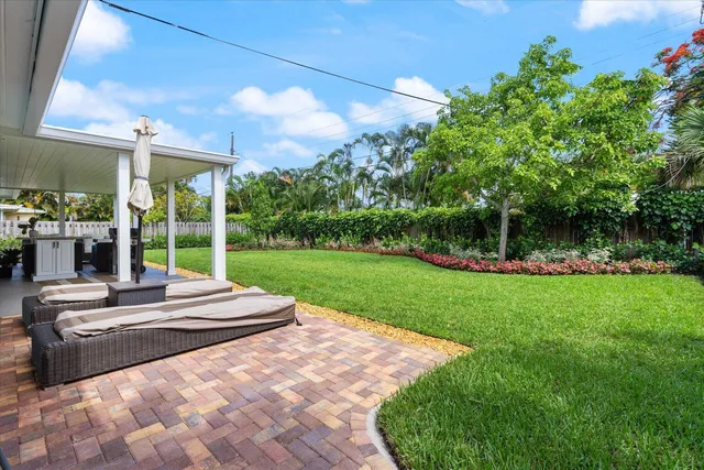 a view of backyard with green space