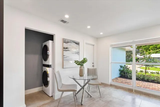 a view of a dining room with furniture window and garden