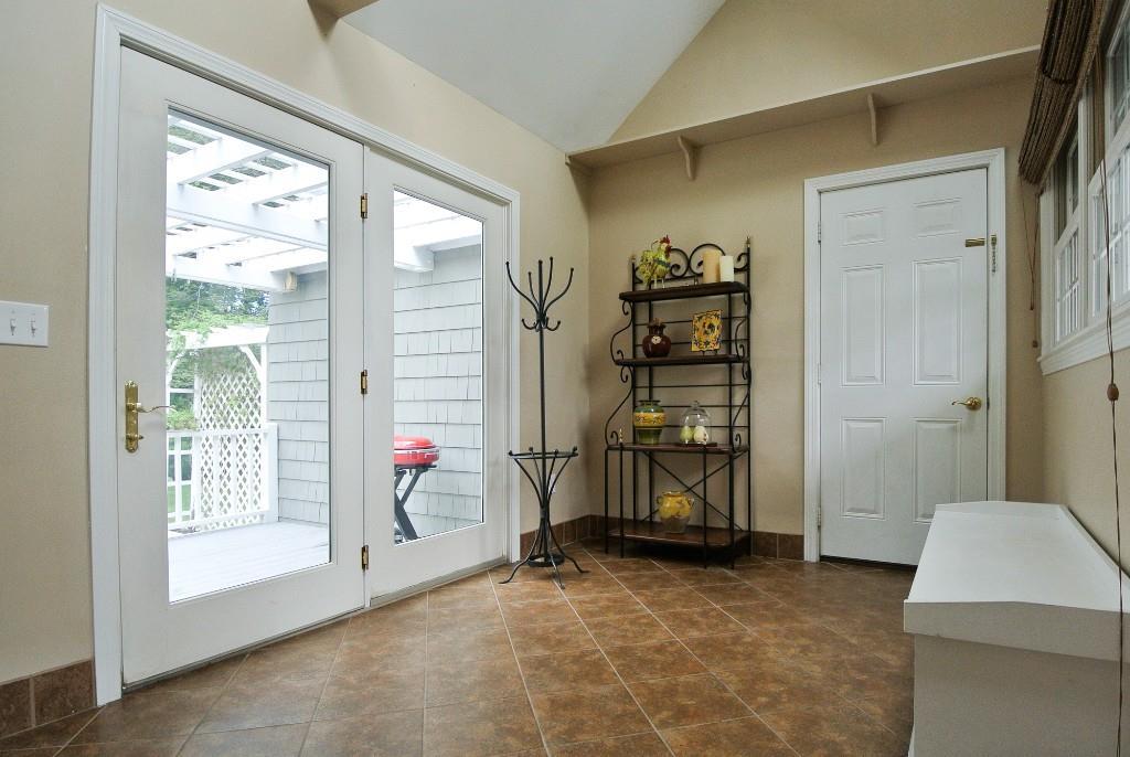 6 Stone Street Saco, ME 04072 - Photo 6 of 35 Convenient tiled mudroom, with...