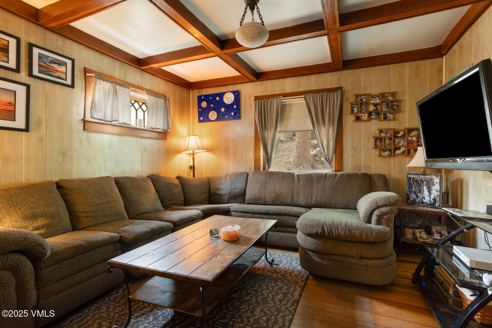 407 Water Street Red Cliff, CO 81649 - Photo 17 of 25 a living room with furniture and a flat screen tv