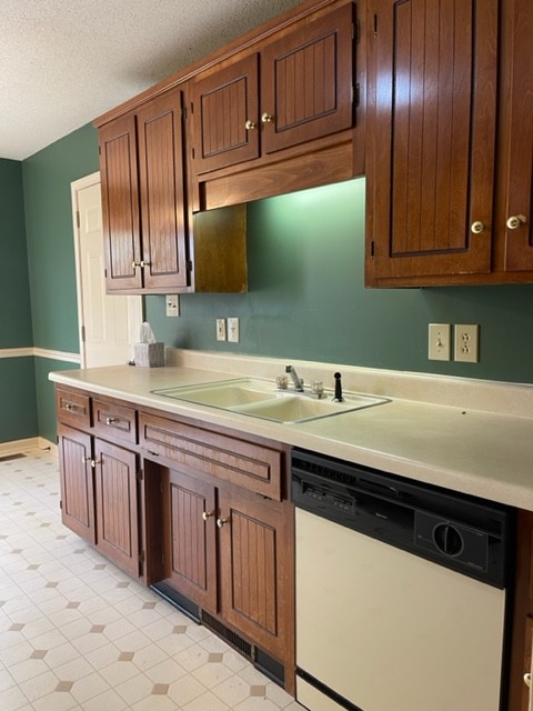 1875 Needmore Road Clarksville, TN 37042 - Photo 11 of 20 a kitchen with stainless steel appliances granite countertop a sink and cabinets