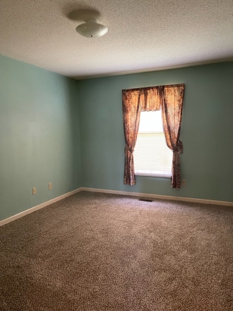 1875 Needmore Road Clarksville, TN 37042 - Photo 16 of 20 an empty room with a window