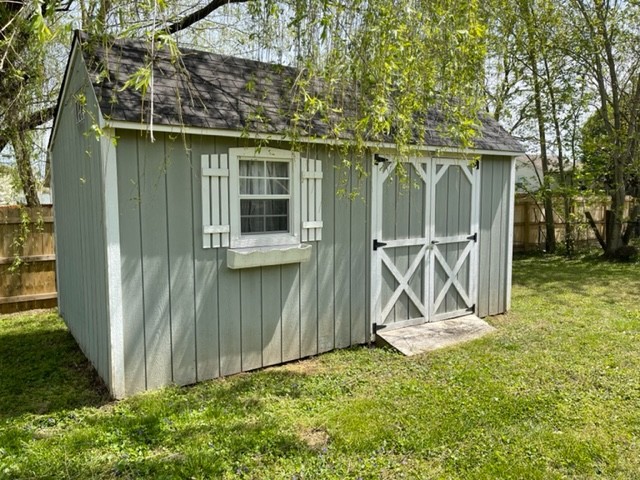 1875 Needmore Road Clarksville, TN 37042 - Photo 2 of 20 a view of a backyard with table and chairs