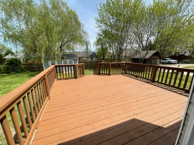 1875 Needmore Road Clarksville, TN 37042 - Photo 4 of 20 a balcony with wooden floor and trees