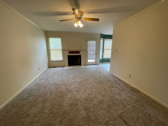 1875 Needmore Road Clarksville, TN 37042 - Photo 6 of 20 an empty room with chandelier fan and windows