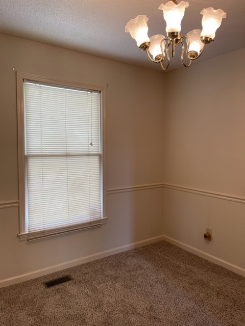 1875 Needmore Road Clarksville, TN 37042 - Photo 8 of 20 en empty room with a window