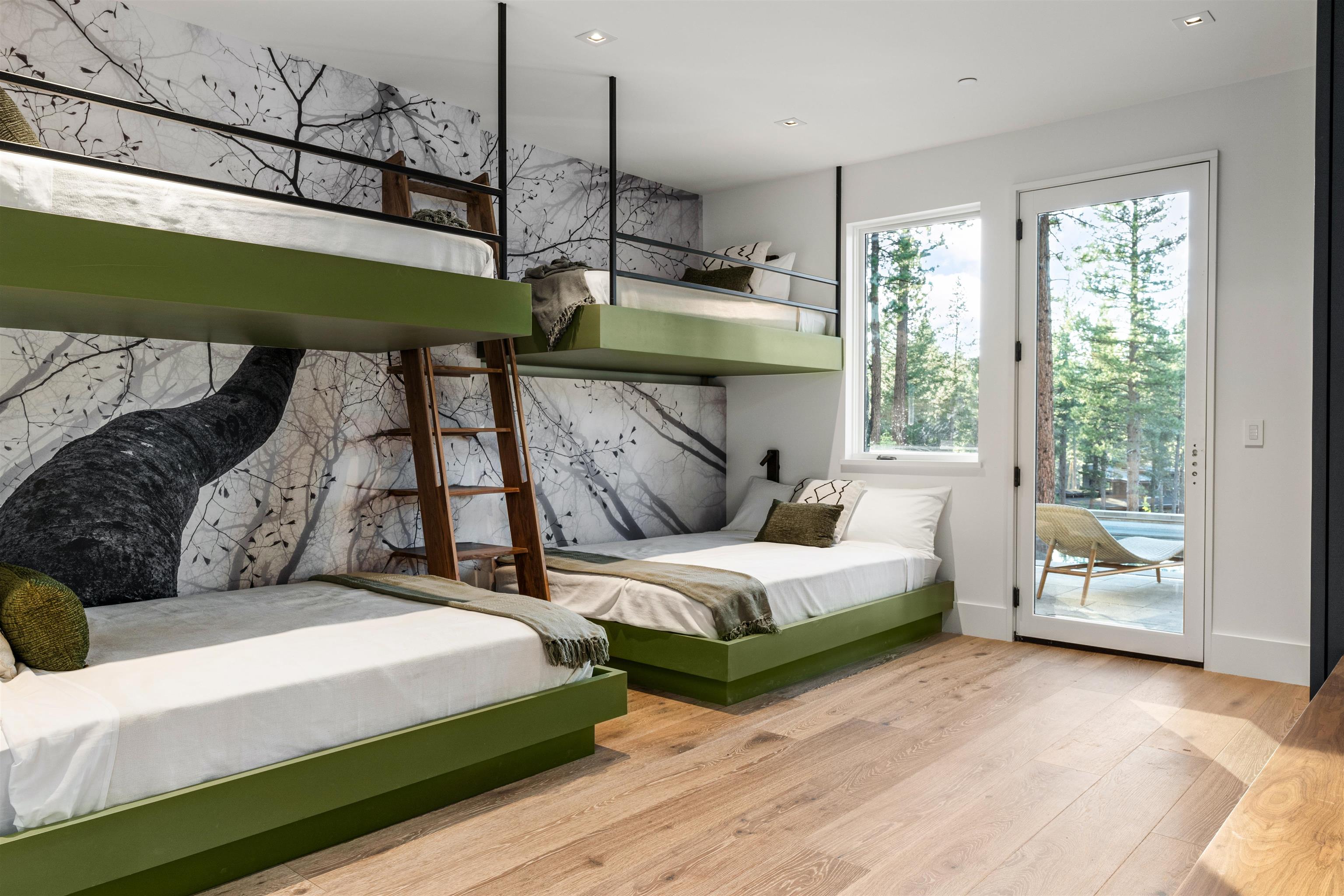 8207 Ehrman Drive Truckee, CA 96161 - Photo 14 of 21 a bedroom with bed and wooden floor