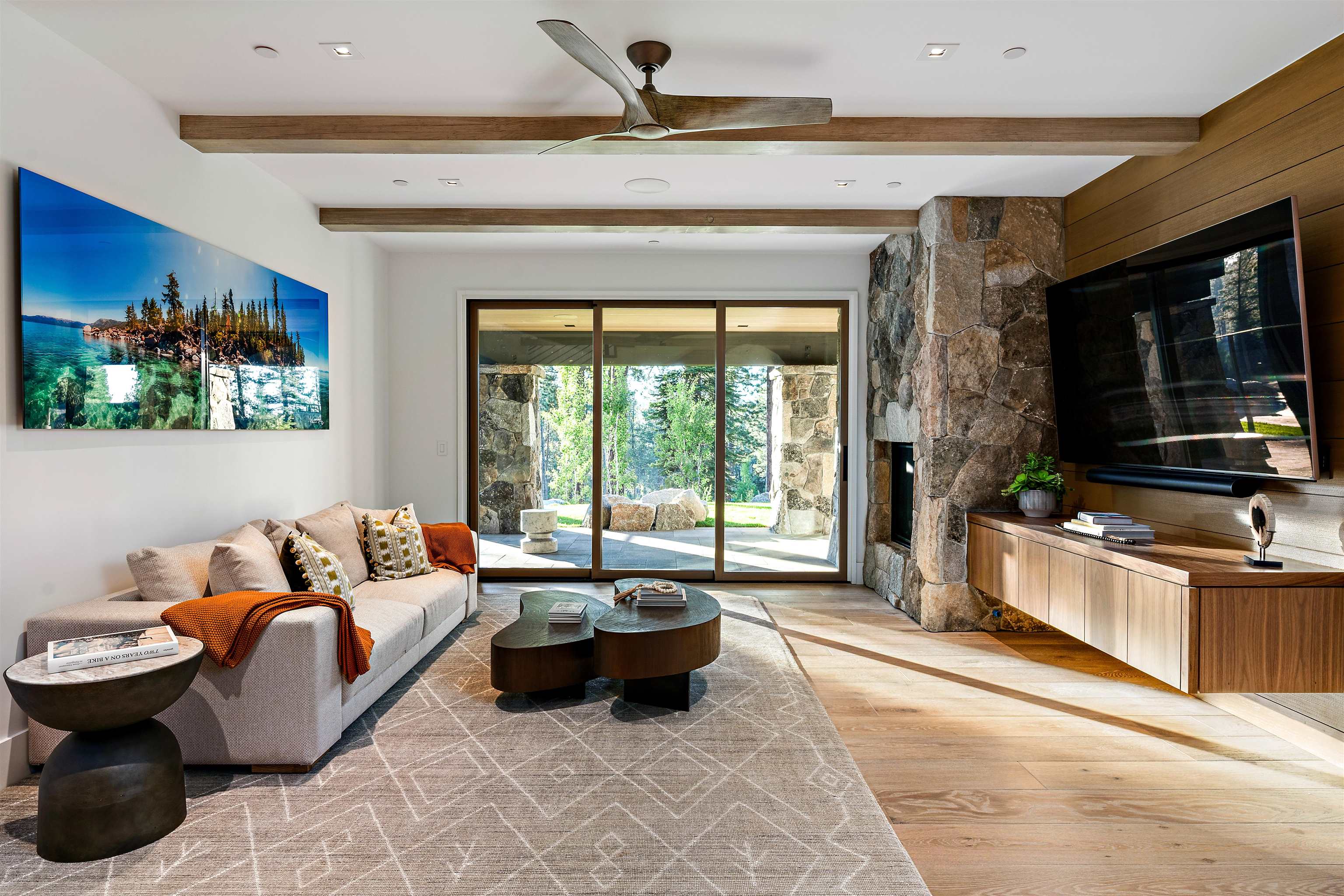8207 Ehrman Drive Truckee, CA 96161 - Photo 15 of 21 a living room with furniture and a flat screen tv