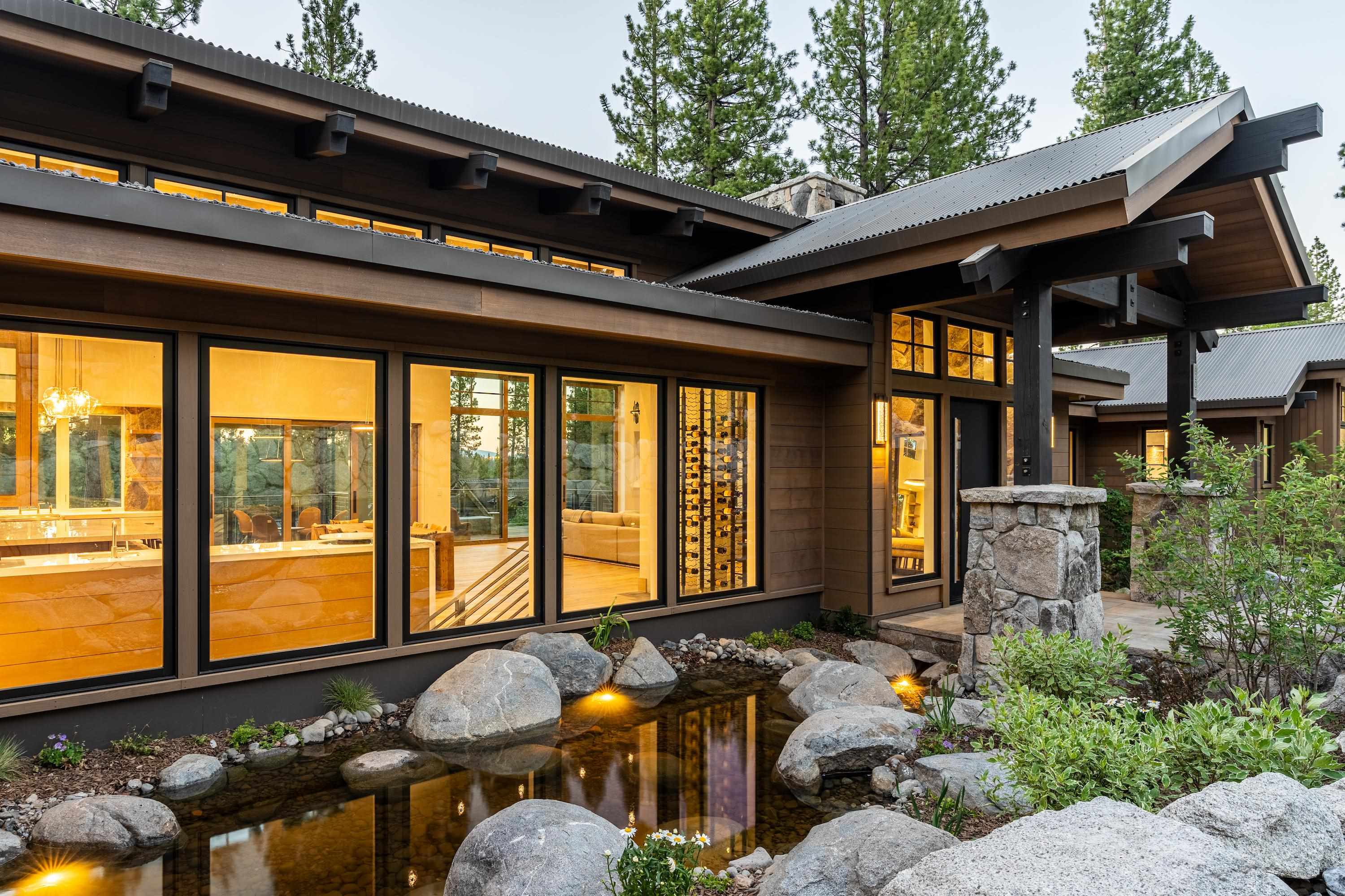 8207 Ehrman Drive Truckee, CA 96161 - Photo 2 of 21 a front view of house with a garden