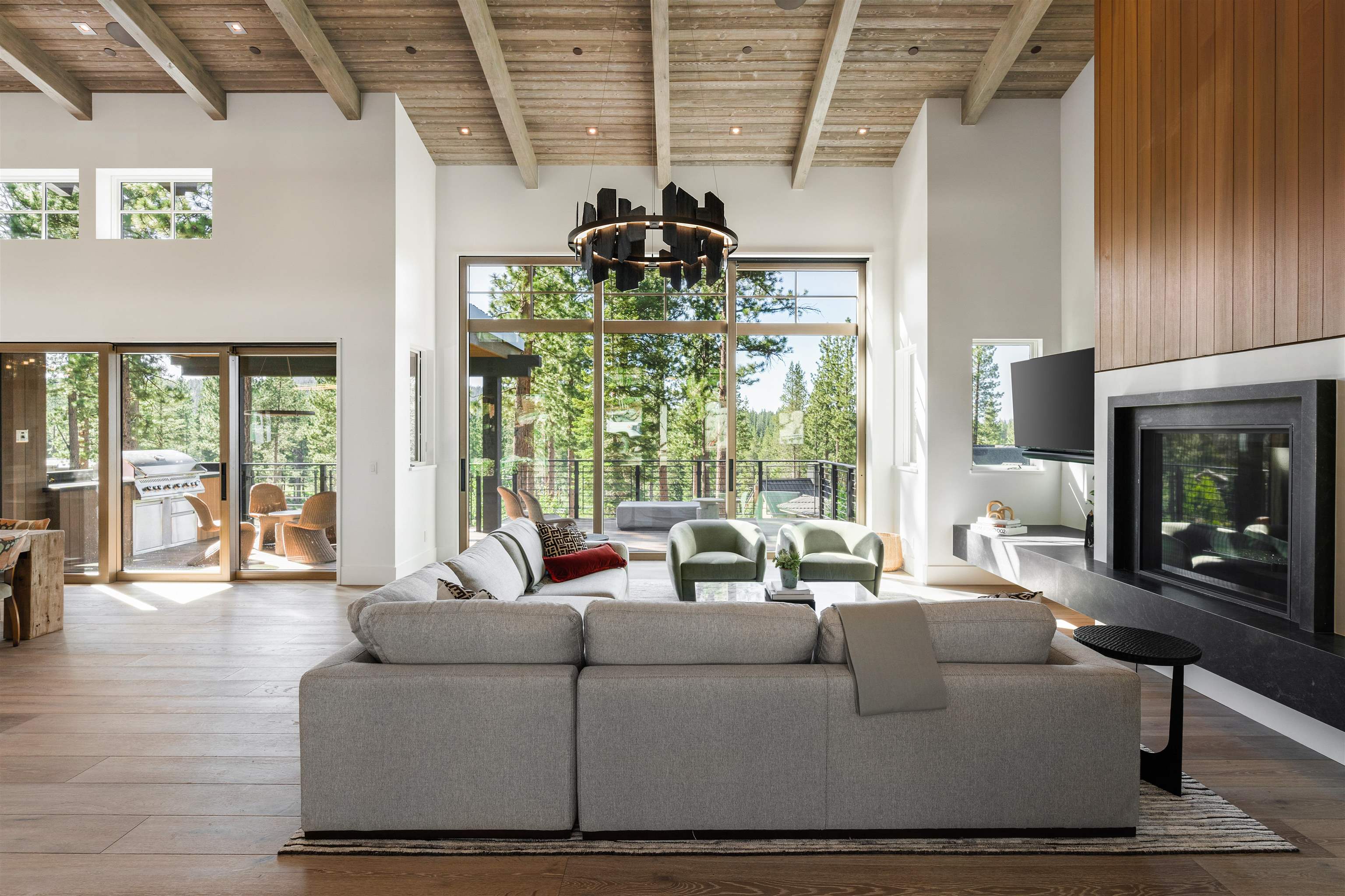 8207 Ehrman Drive Truckee, CA 96161 - Photo 6 of 21 a living room with furniture and a chandelier
