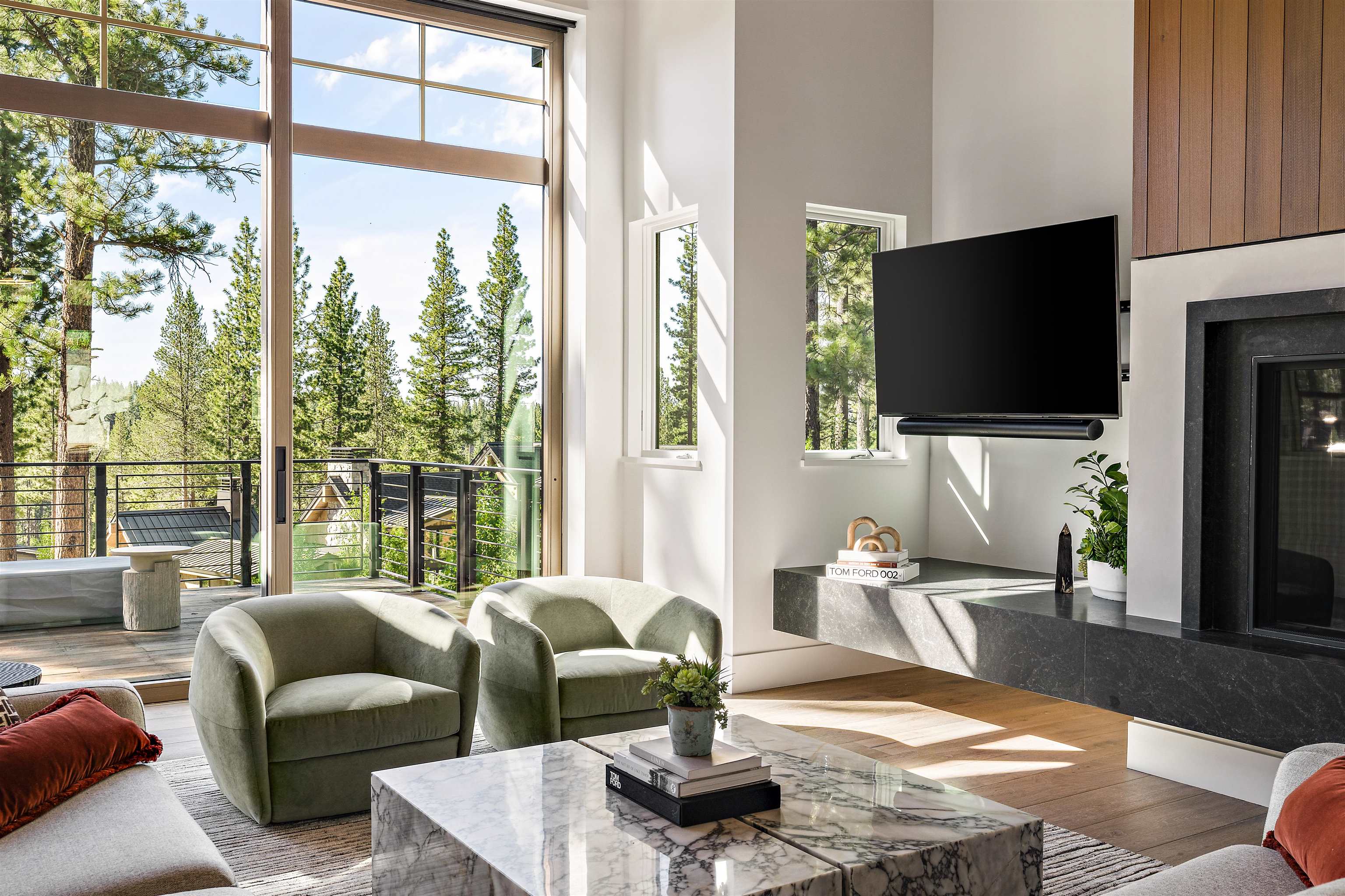 8207 Ehrman Drive Truckee, CA 96161 - Photo 7 of 21 a living room with furniture and a flat screen tv