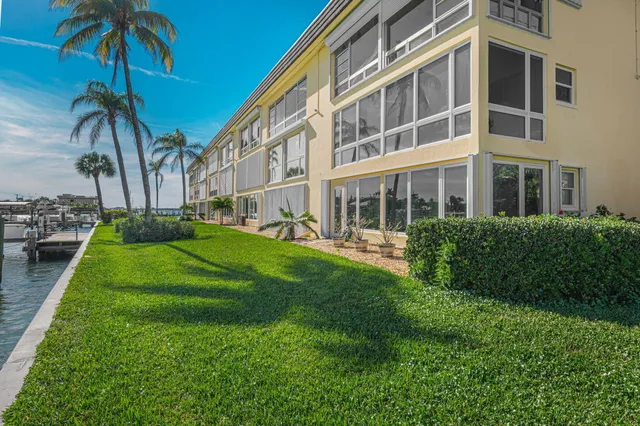 a view of a building with a yard