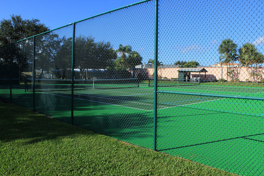1351 Bayshore Drive, Unit 304 Fort Pierce, FL 34949 - Photo 17 of 25 a view of a house and a big yard