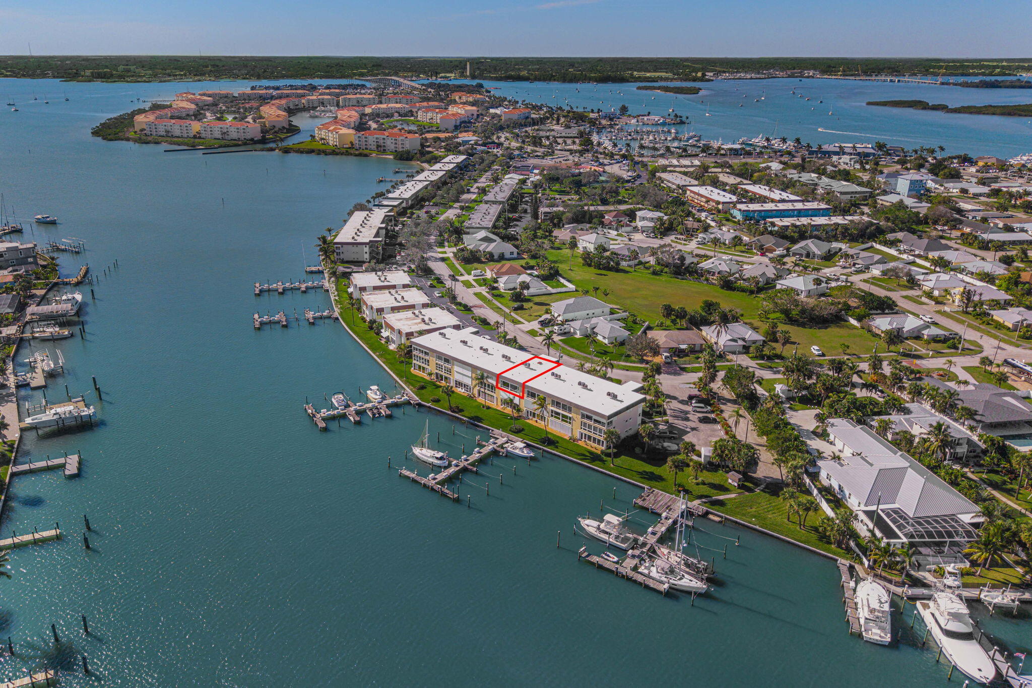 1351 Bayshore Drive, Unit 304 Fort Pierce, FL 34949 - Photo 3 of 25 an aerial view of a house with a lake view
