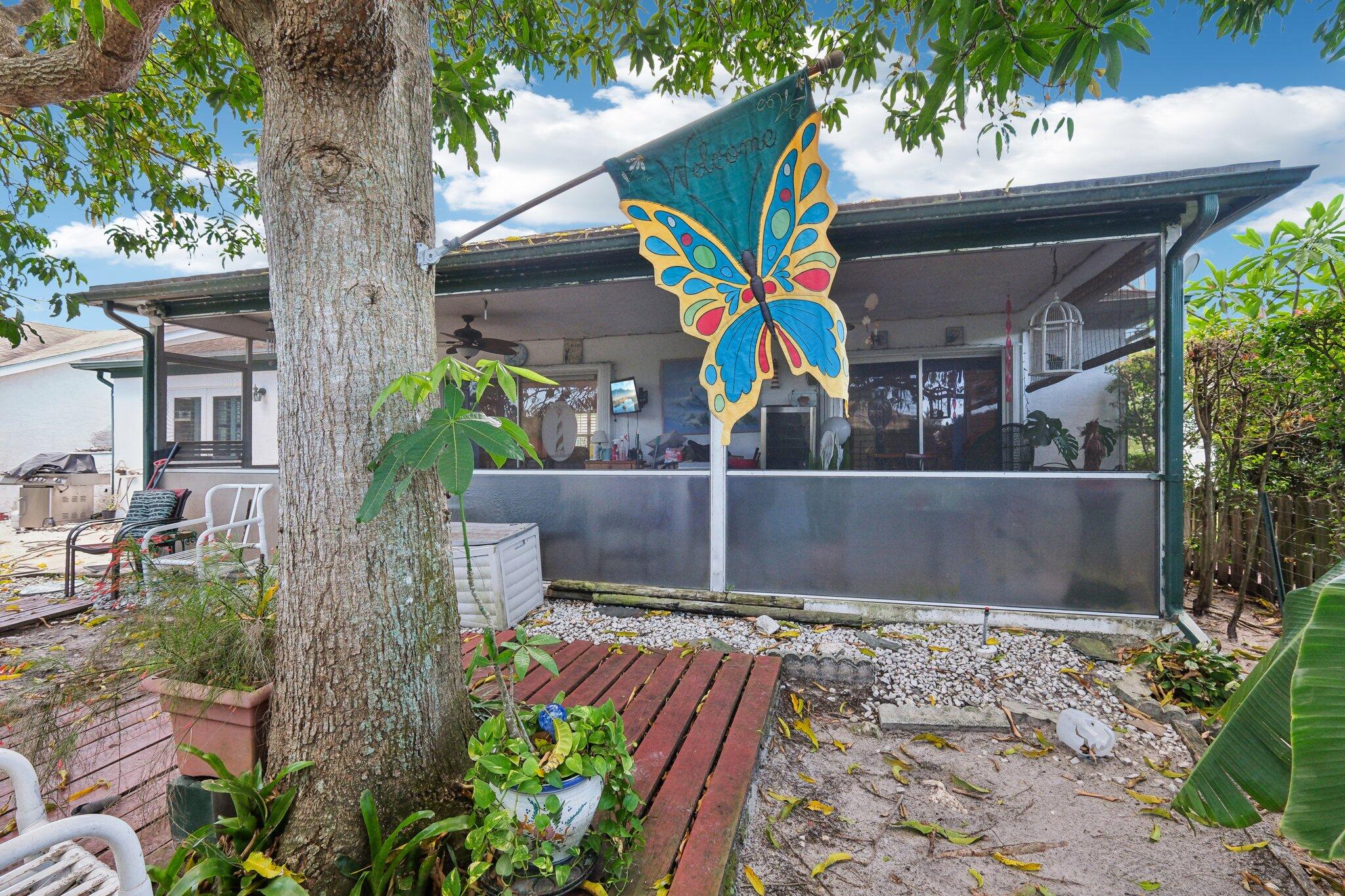 125 Wandering Trail, Unit TRL Jupiter, FL 33458 - Photo 21 of 22 a view of an entryway of a house