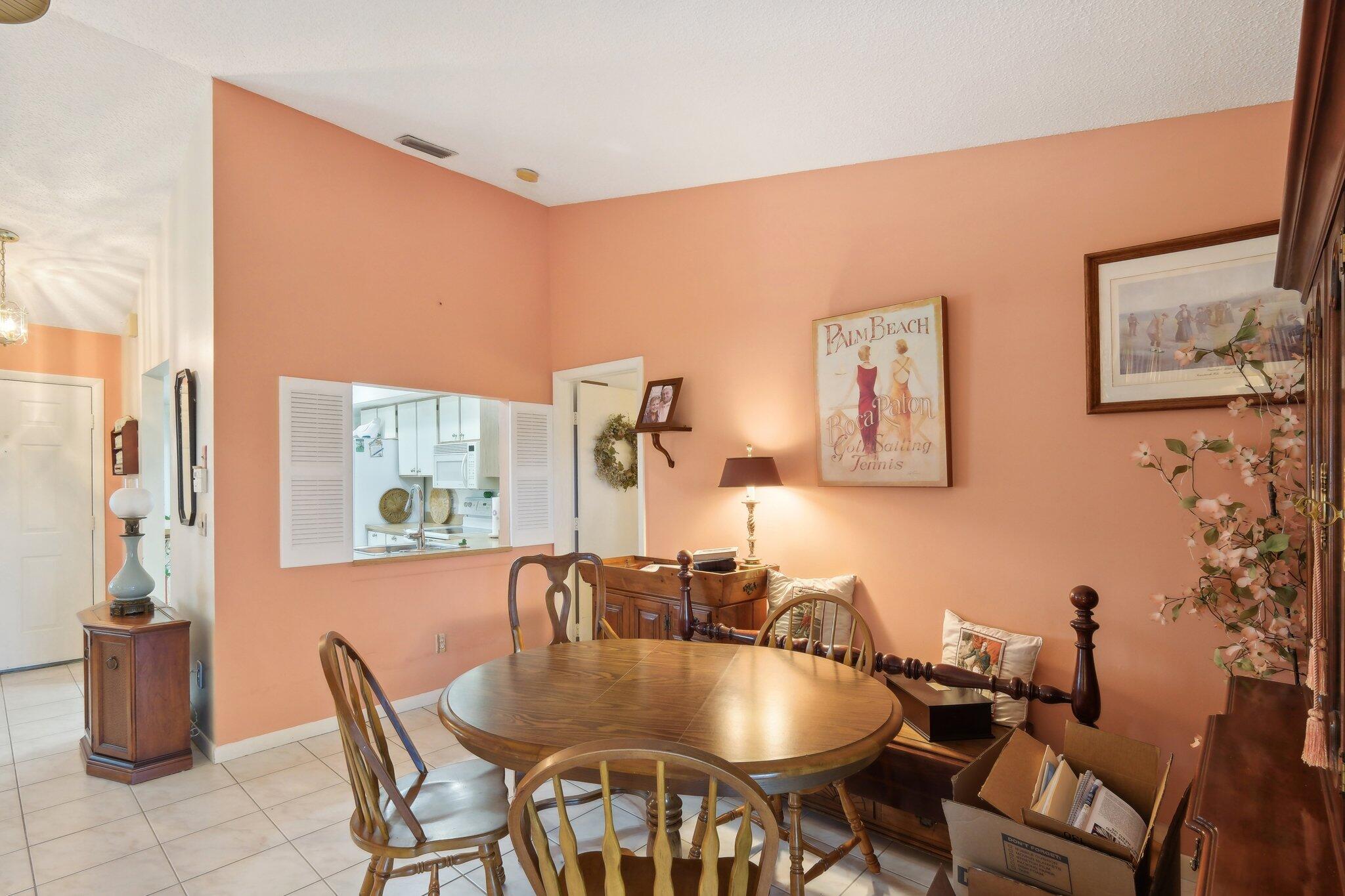 125 Wandering Trail, Unit TRL Jupiter, FL 33458 - Photo 5 of 22 a dining room with furniture and window