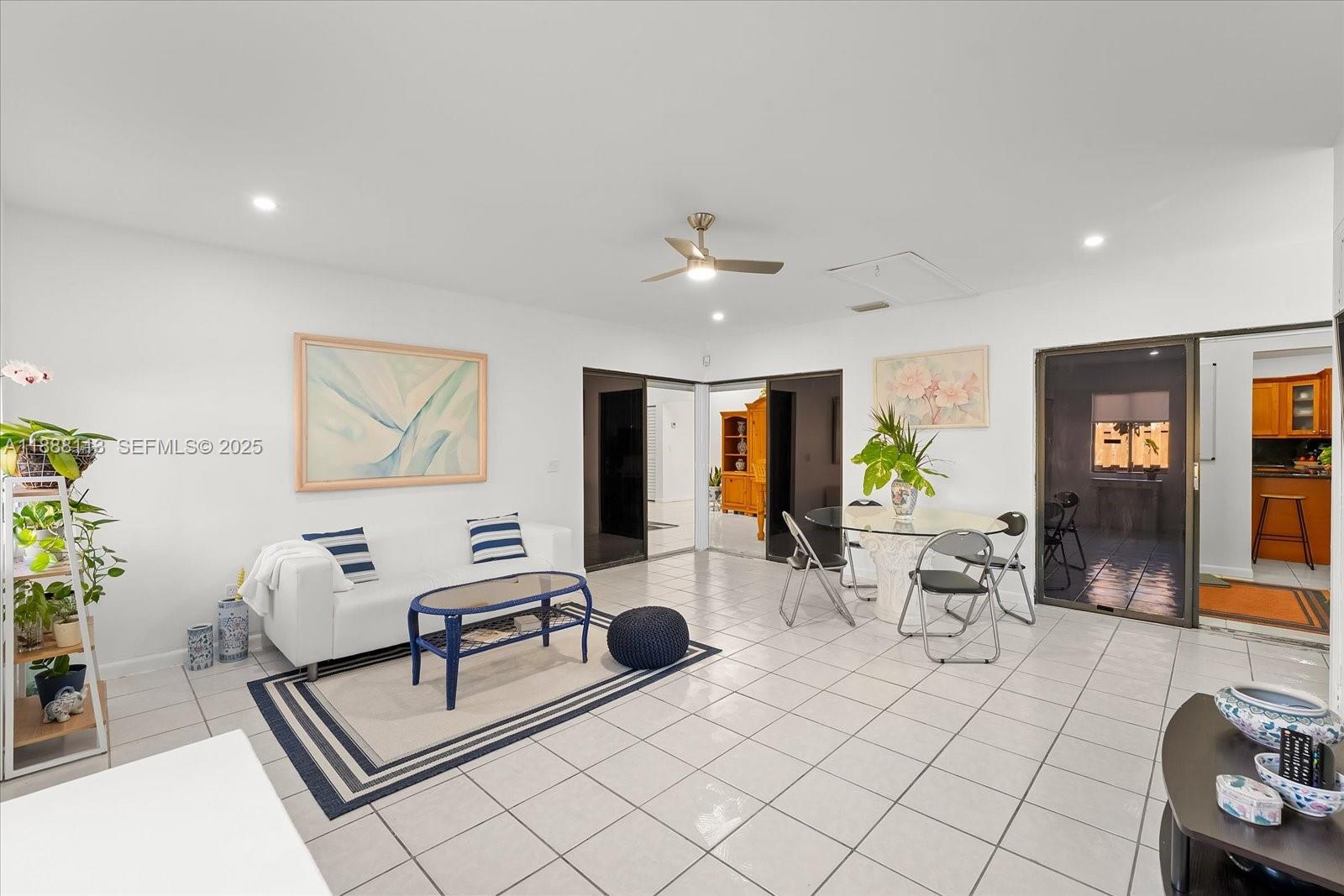 13556 Southwest 285th Terrace Homestead, FL 33033 - Photo 12 of 25 a living room with furniture and wooden floor