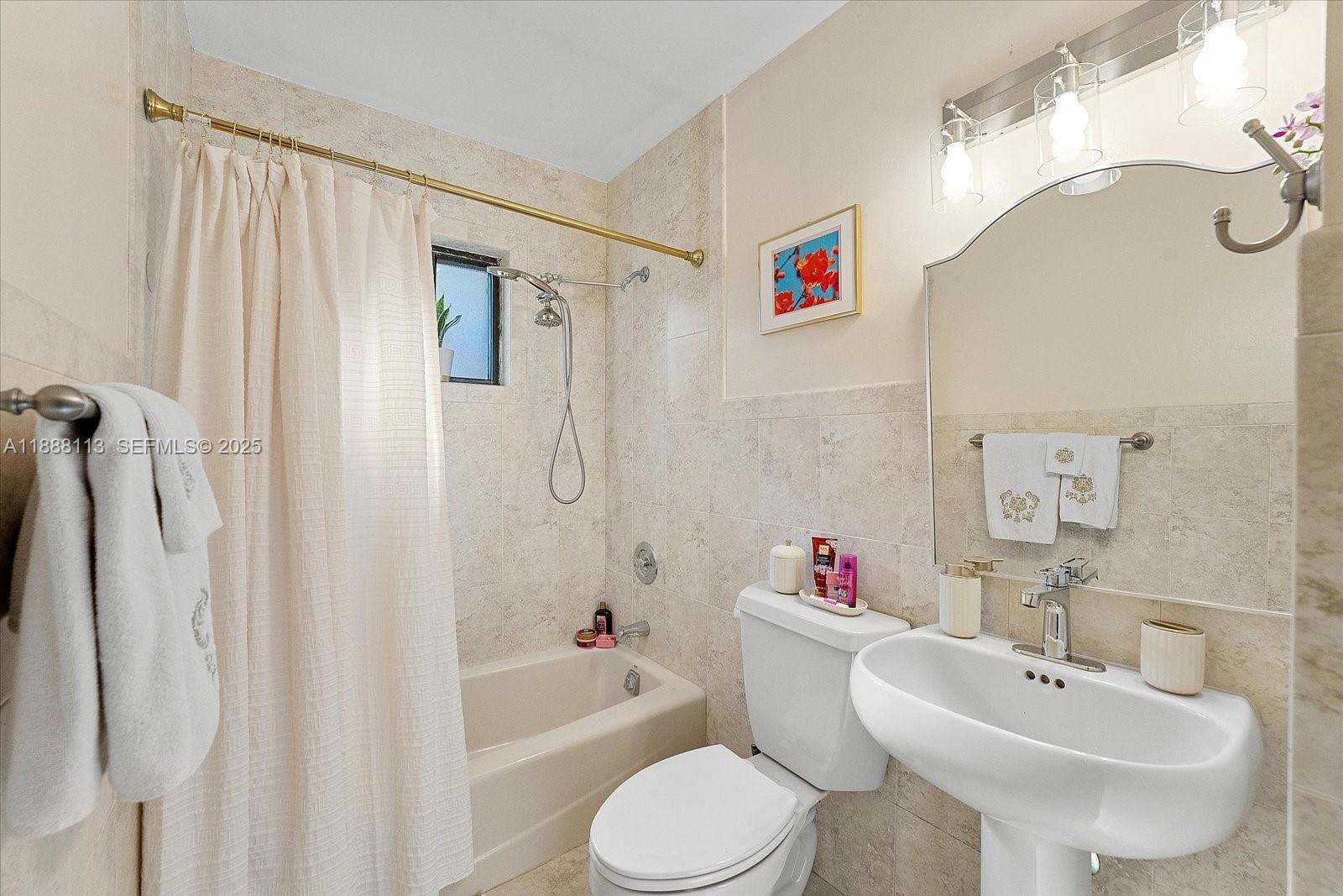 13556 Southwest 285th Terrace Homestead, FL 33033 - Photo 14 of 25 a bathroom with a sink toilet and shower