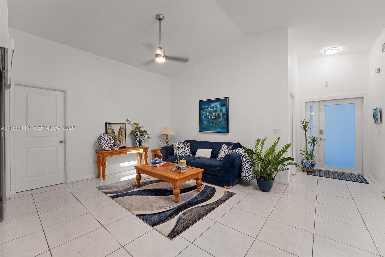 13556 Southwest 285th Terrace Homestead, FL 33033 - Photo 2 of 25 a living room with furniture