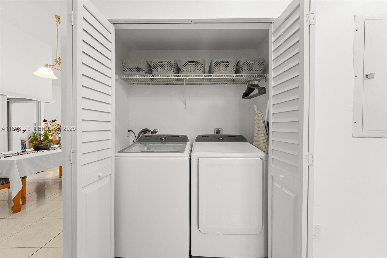 13556 Southwest 285th Terrace Homestead, FL 33033 - Photo 21 of 25 a utility room with dryer and washer