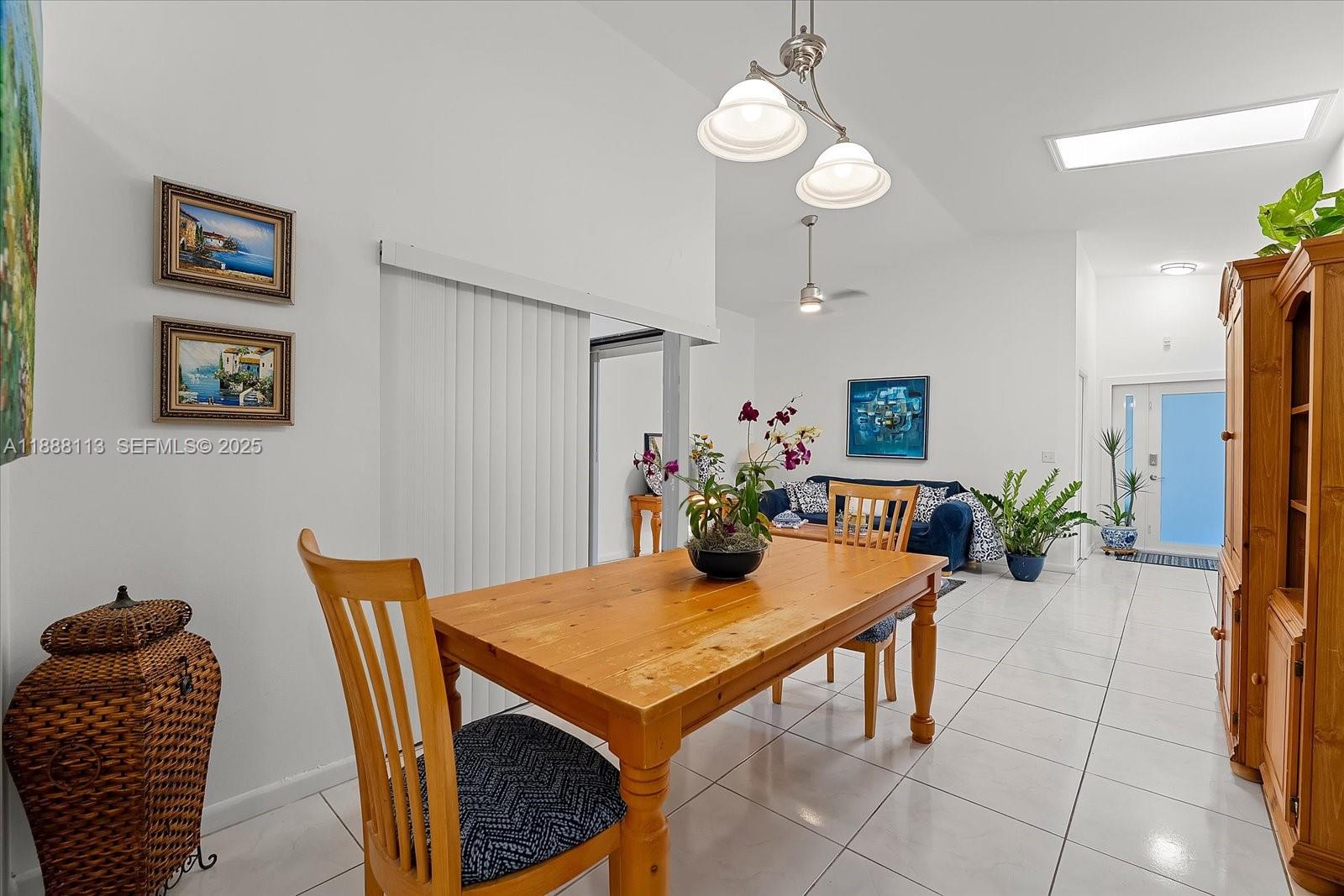 13556 Southwest 285th Terrace Homestead, FL 33033 - Photo 5 of 25 a view of a dining room with furniture