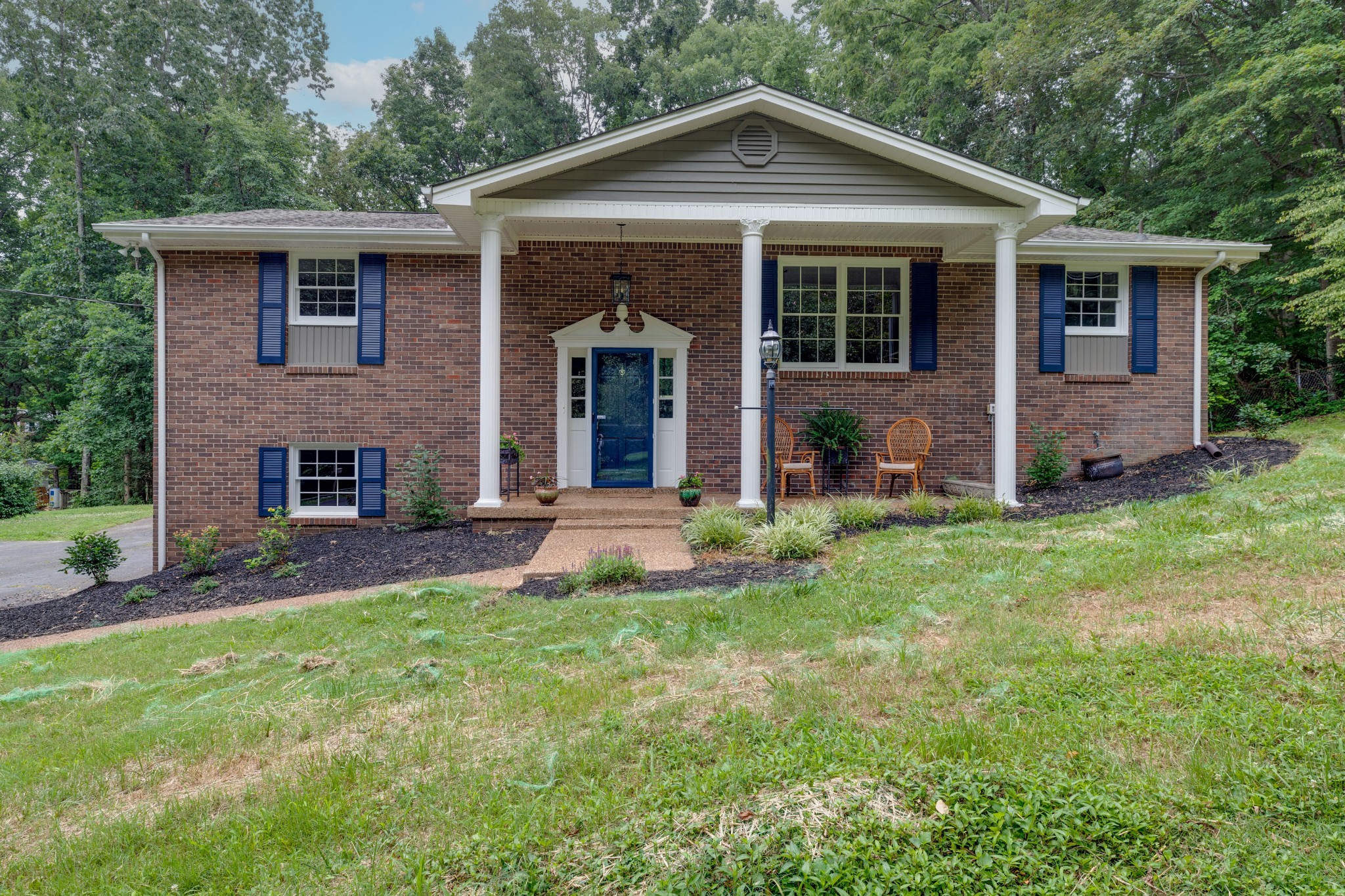 112 Lee Road Dickson, TN 37055 - Photo 1 of 39 a front view of a house with a yard