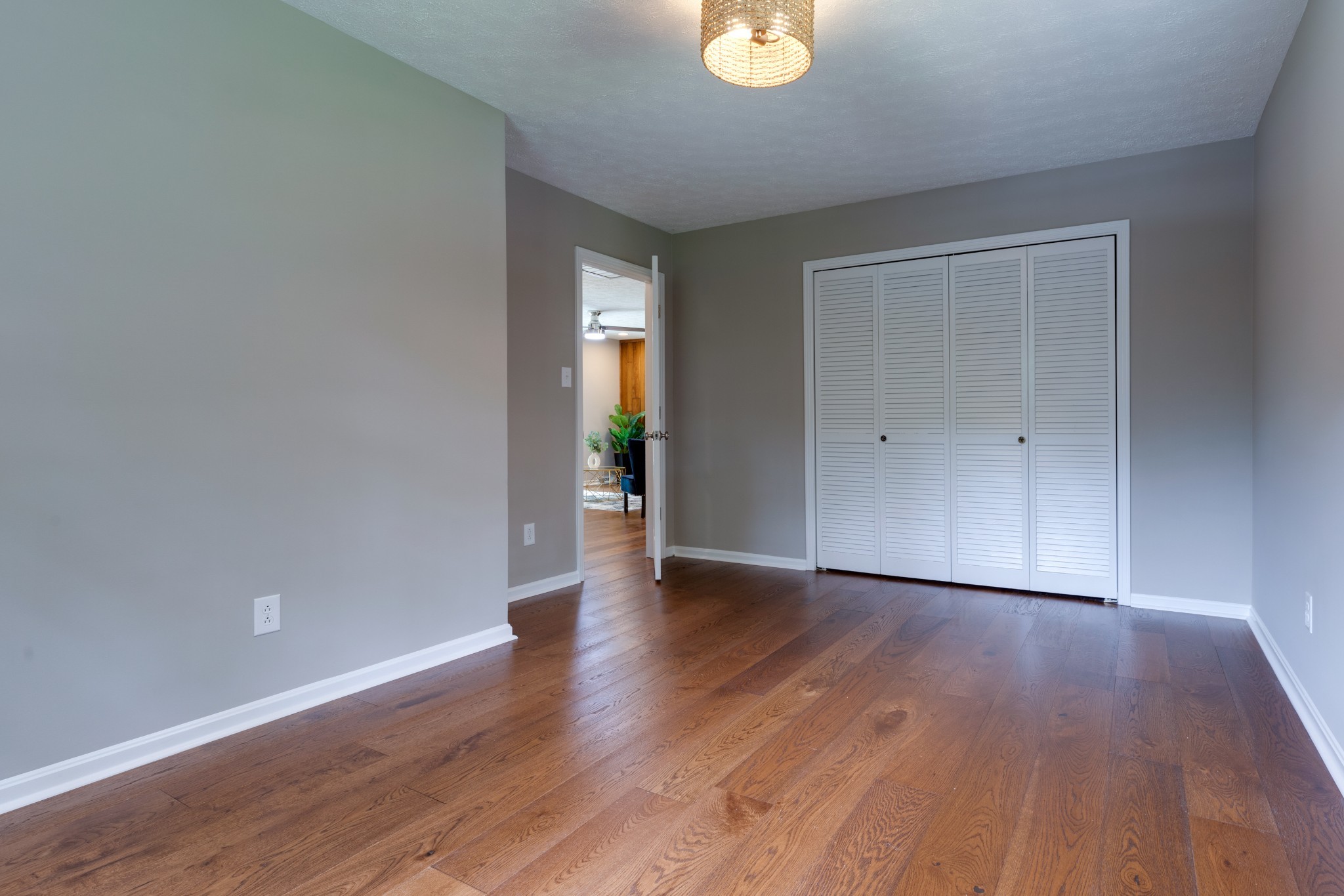 112 Lee Road Dickson, TN 37055 - Photo 20 of 39 a view of an empty room with wooden floor and a window