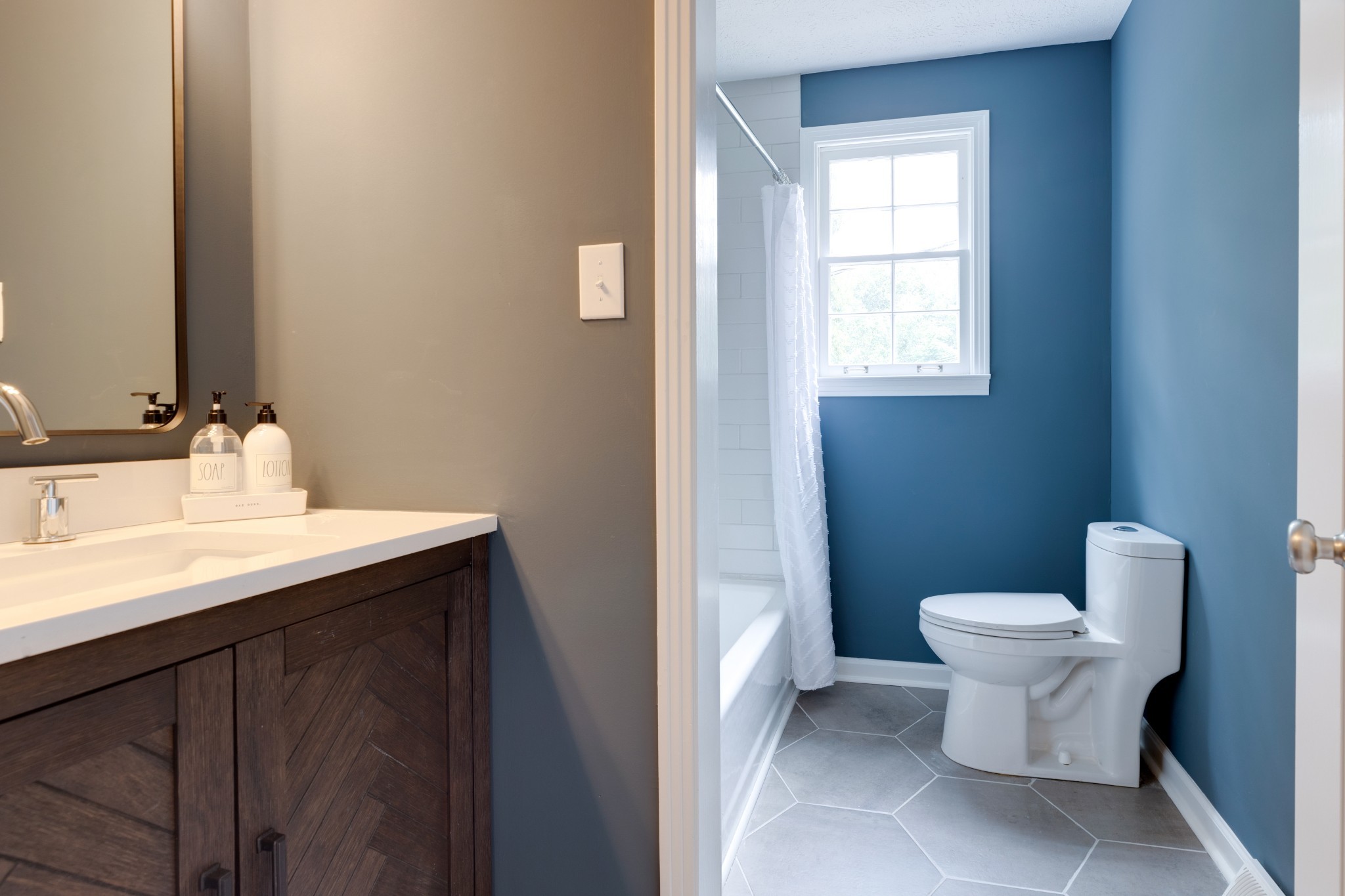 112 Lee Road Dickson, TN 37055 - Photo 22 of 39 a bathroom with a sink toilet and a mirror