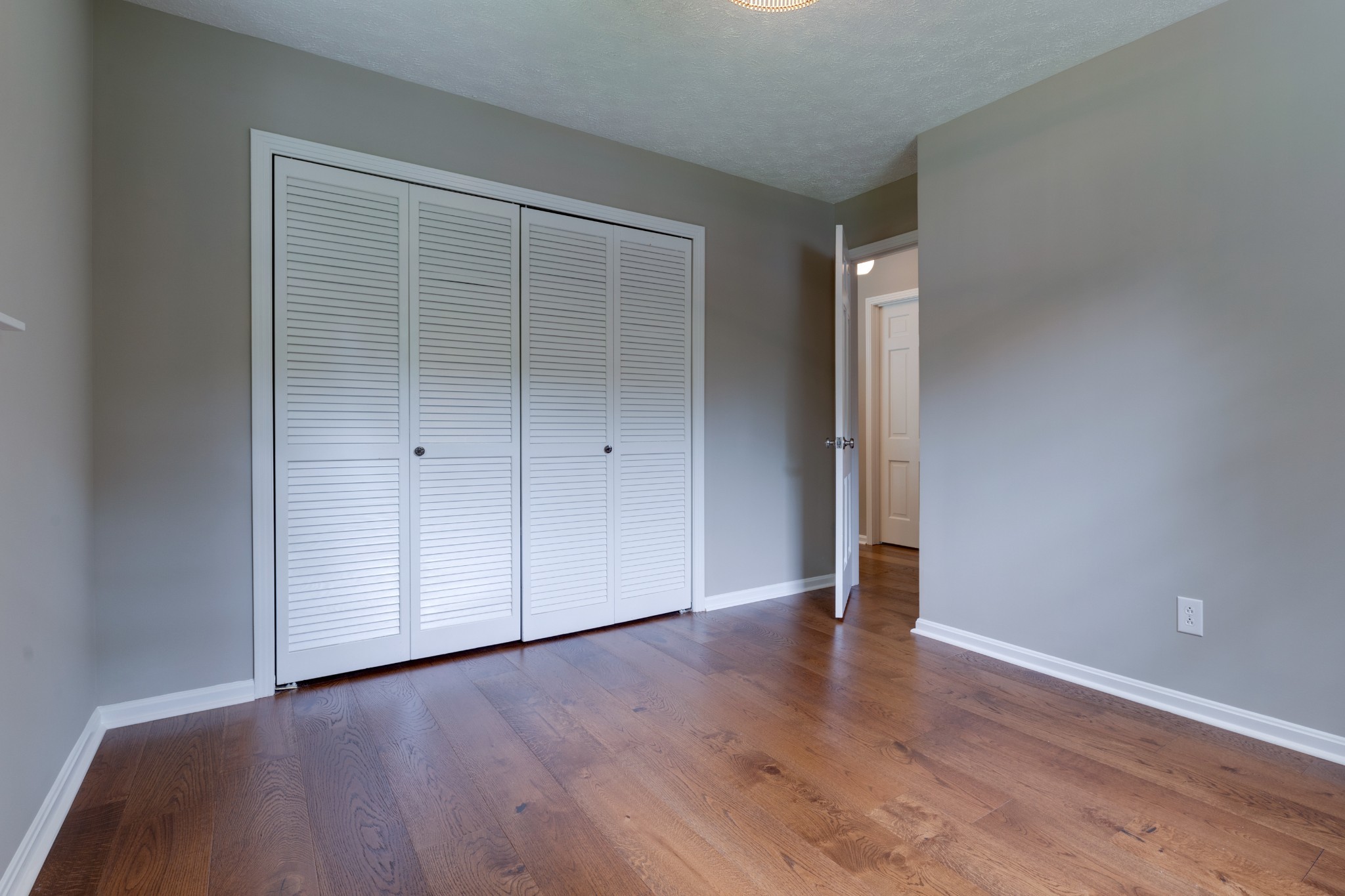 112 Lee Road Dickson, TN 37055 - Photo 24 of 39 an empty room with wooden floor