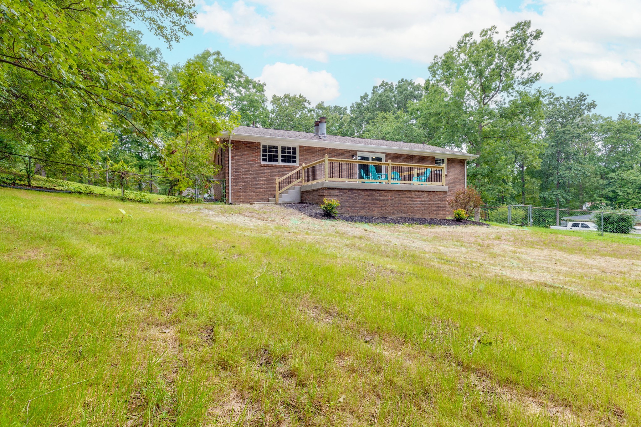 112 Lee Road Dickson, TN 37055 - Photo 34 of 39 a view of house with yard and trees in the background