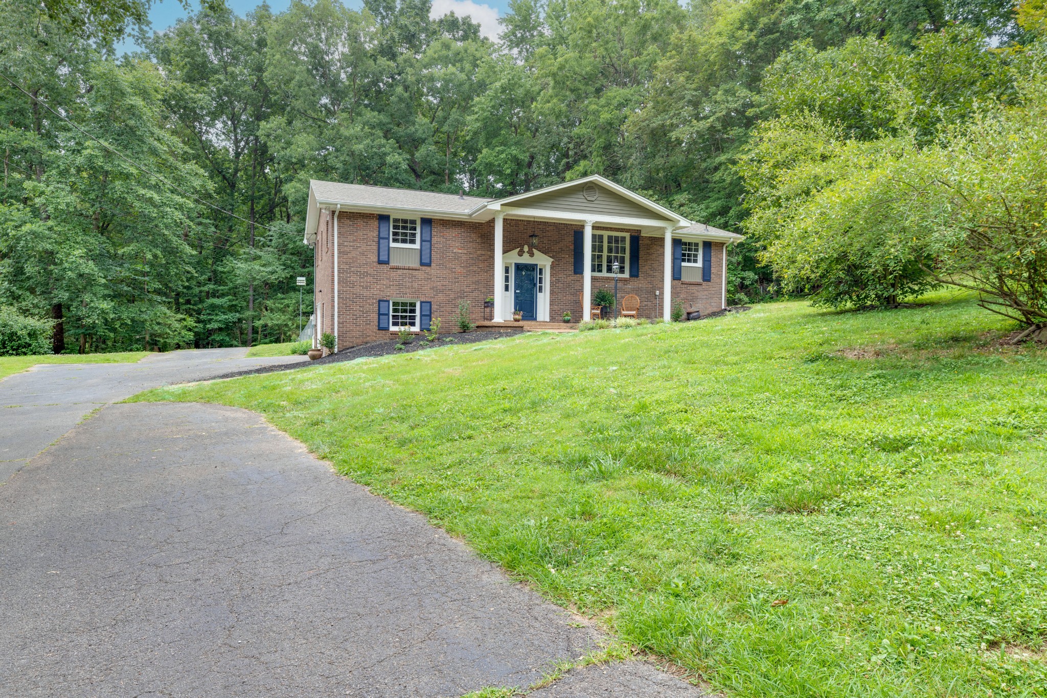 112 Lee Road Dickson, TN 37055 - Photo 38 of 39 a front view of a house with a yard