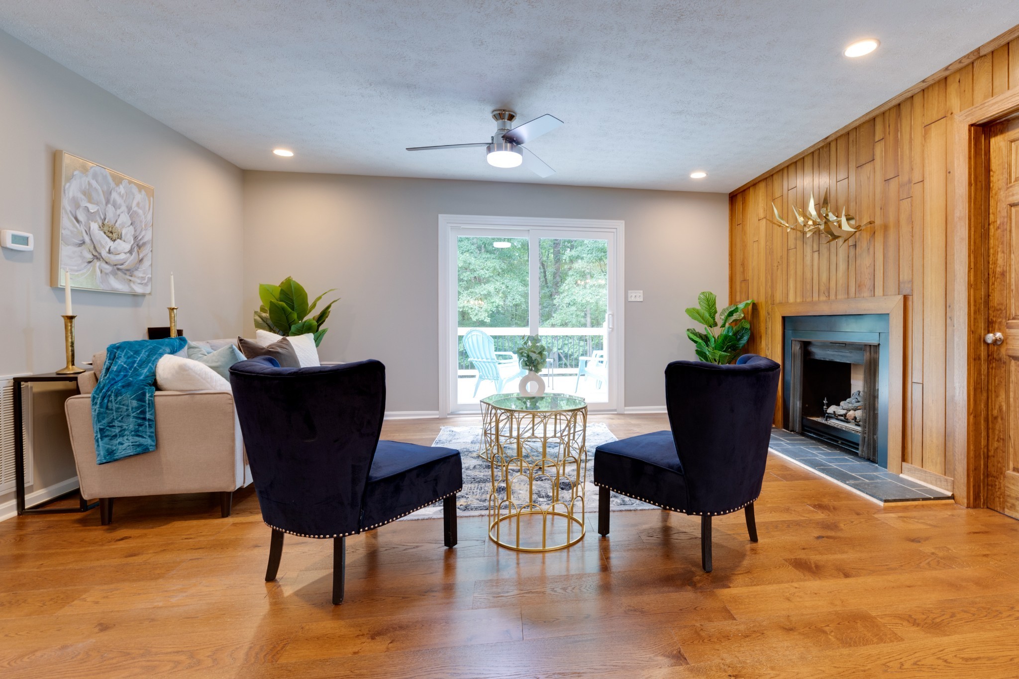 112 Lee Road Dickson, TN 37055 - Photo 4 of 39 a living room with furniture a potted plant and a fireplace