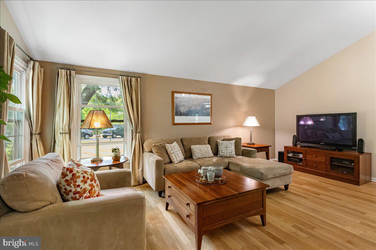 3 Strathmore Place Princeton Junction, NJ 08550 - Photo 12 of 29 a living room with furniture and a flat screen tv