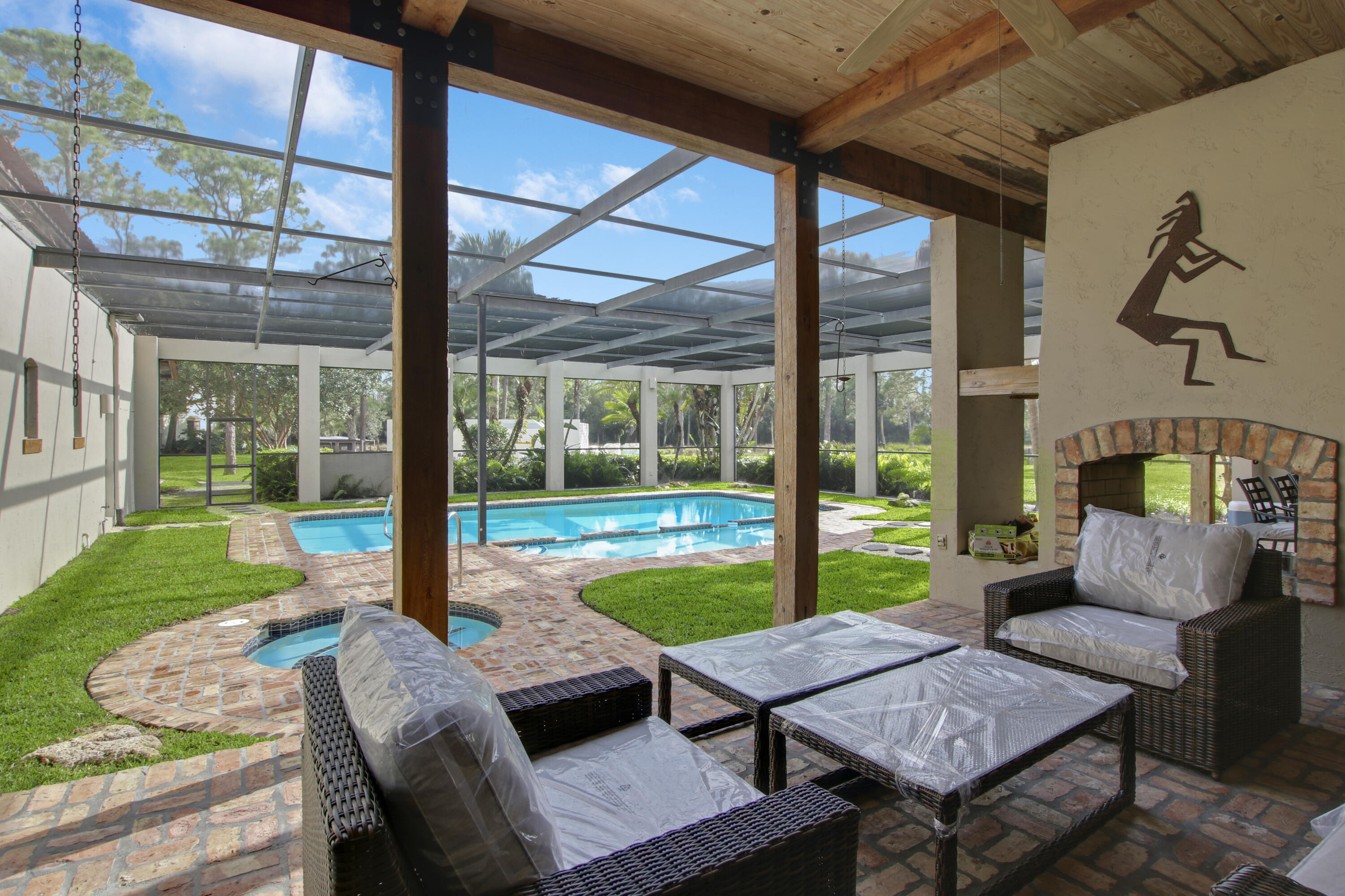 19900-addl Southeast Mack Dairy Road Jupiter, FL 33478 - Photo 20 of 50 Patio/fireplace