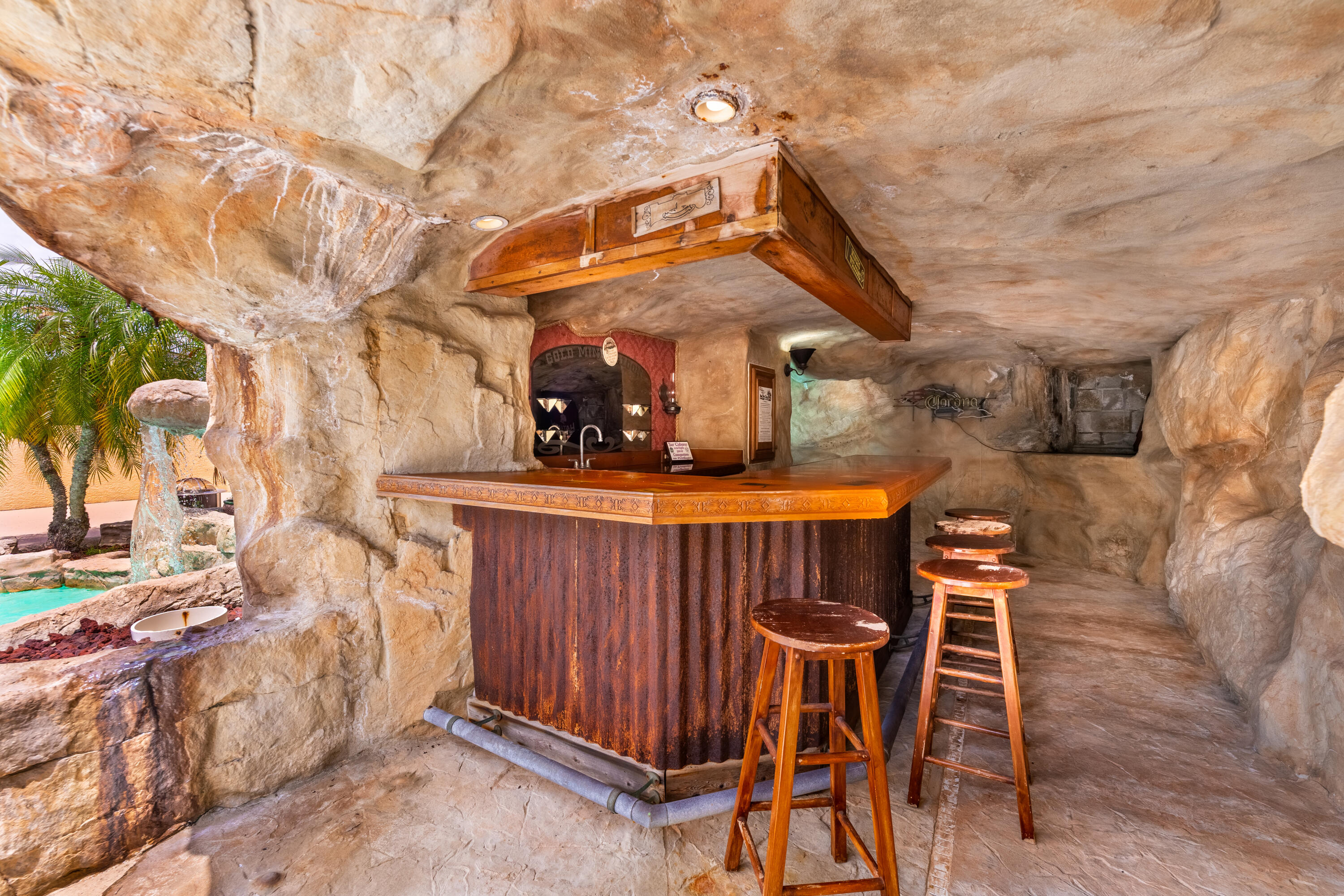7151 Southwest 13th Street Okeechobee, FL 34974 - Photo 26 of 35 Bar in cave by pool area