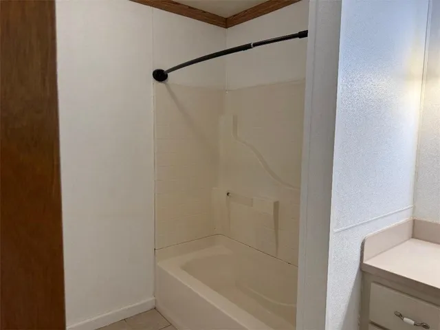 a bathroom with a bathtub