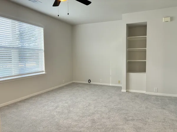 an empty room with a window