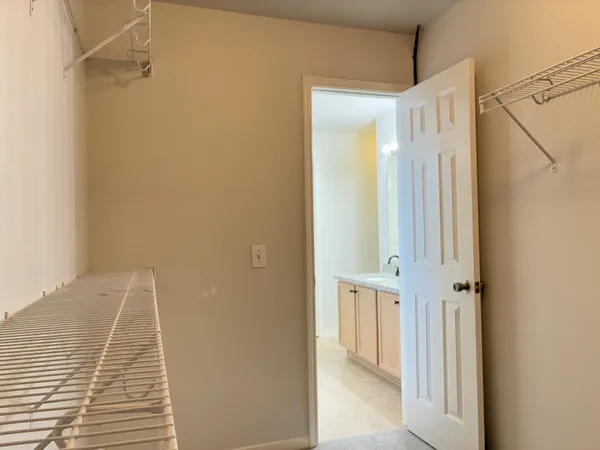 a view of a room with racks on the wall