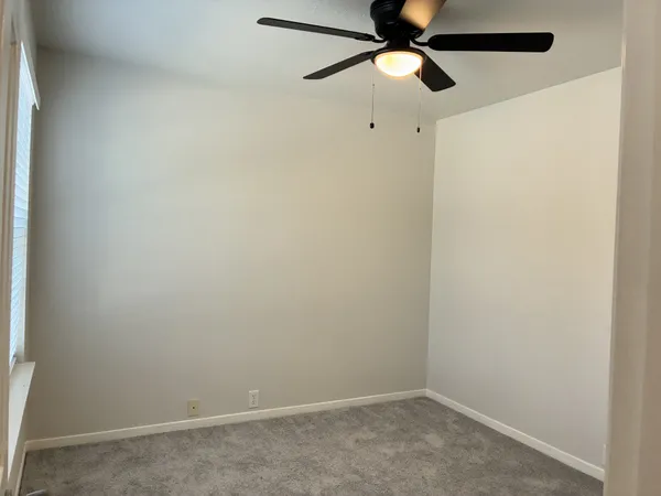 a view of a room with racks on the wall