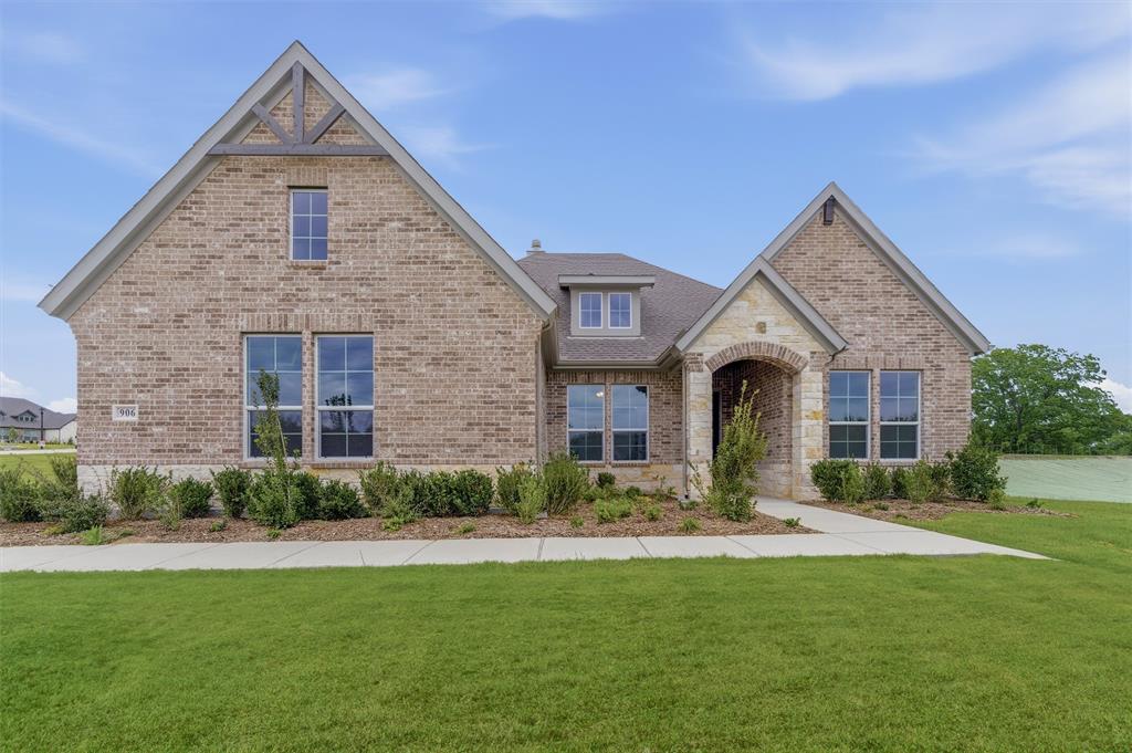 906 Perrin Lane Van Alstyne, TX 75495 - Photo 3 of 30 a front view of a house with a yard