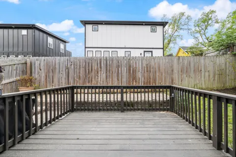 a view of house with outdoor seating area