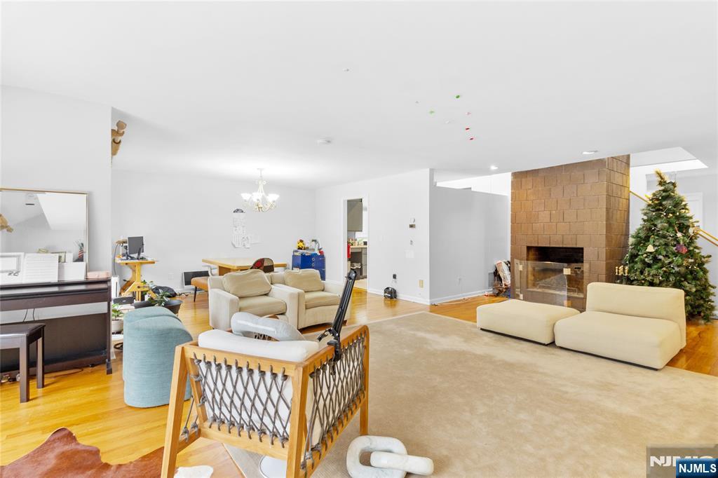 55 Hidden Ledge Road Englewood, NJ 07631 - Photo 5 of 22 a view of a dining room with furniture