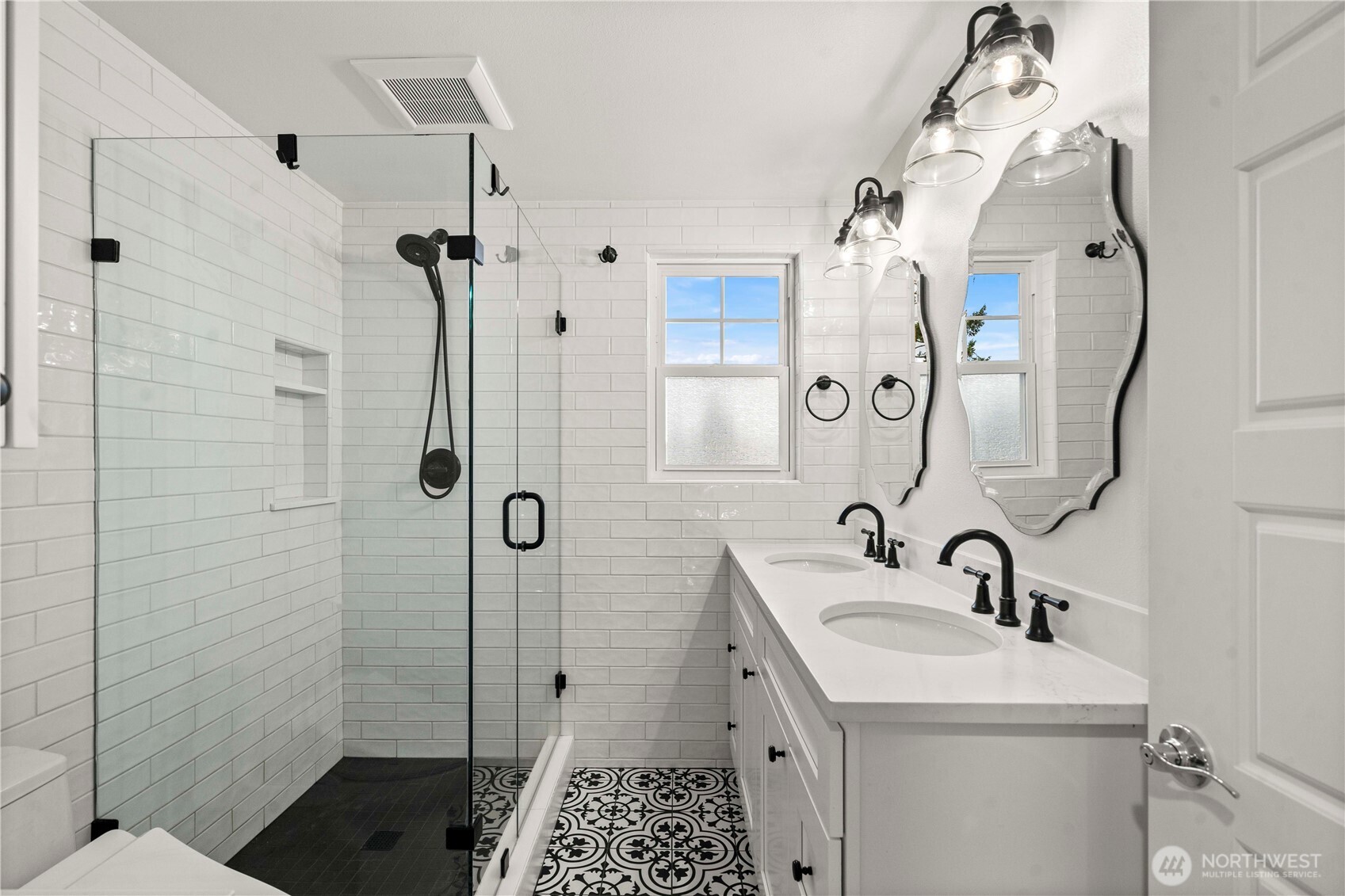 1001 South Prospect Street Tacoma, WA 98405 - Photo 27 of 40 a bathroom with a sink a toilet and shower