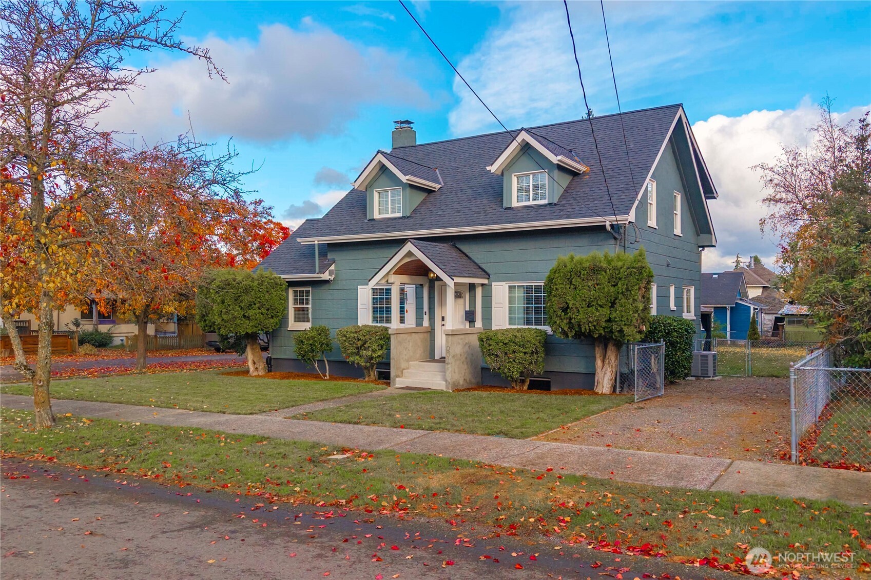 1001 South Prospect Street Tacoma, WA 98405 - Photo 3 of 40 a view of a house with a yard