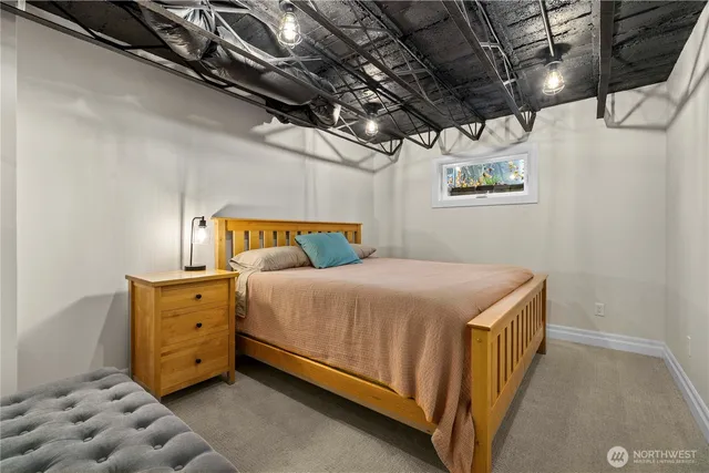 a view of livingroom with workspace and windows