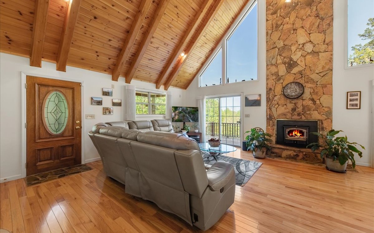94 Mull Ln Circle Morganton, GA 30560 - Photo 18 of 67 a living room with furniture and a fireplace